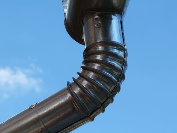 Metal Downspout Installation in Kingwood